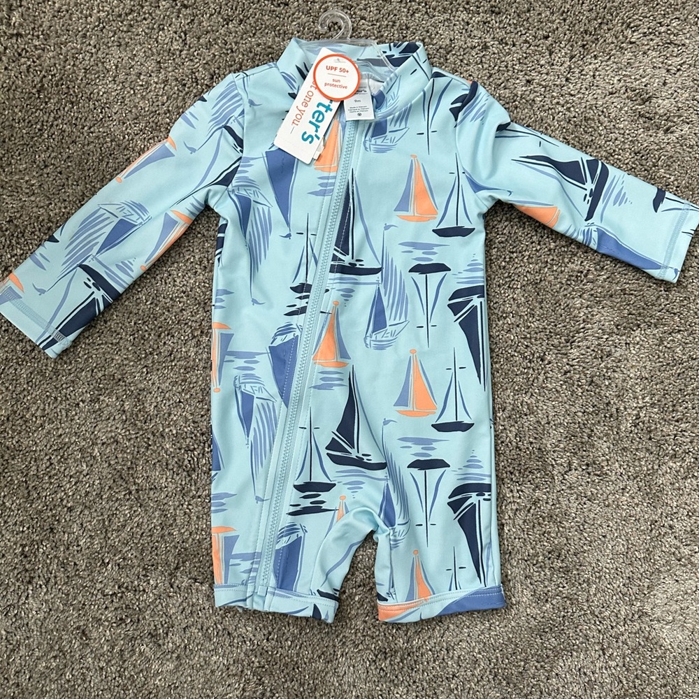Swimming onesie, size 9 months, new with tags.